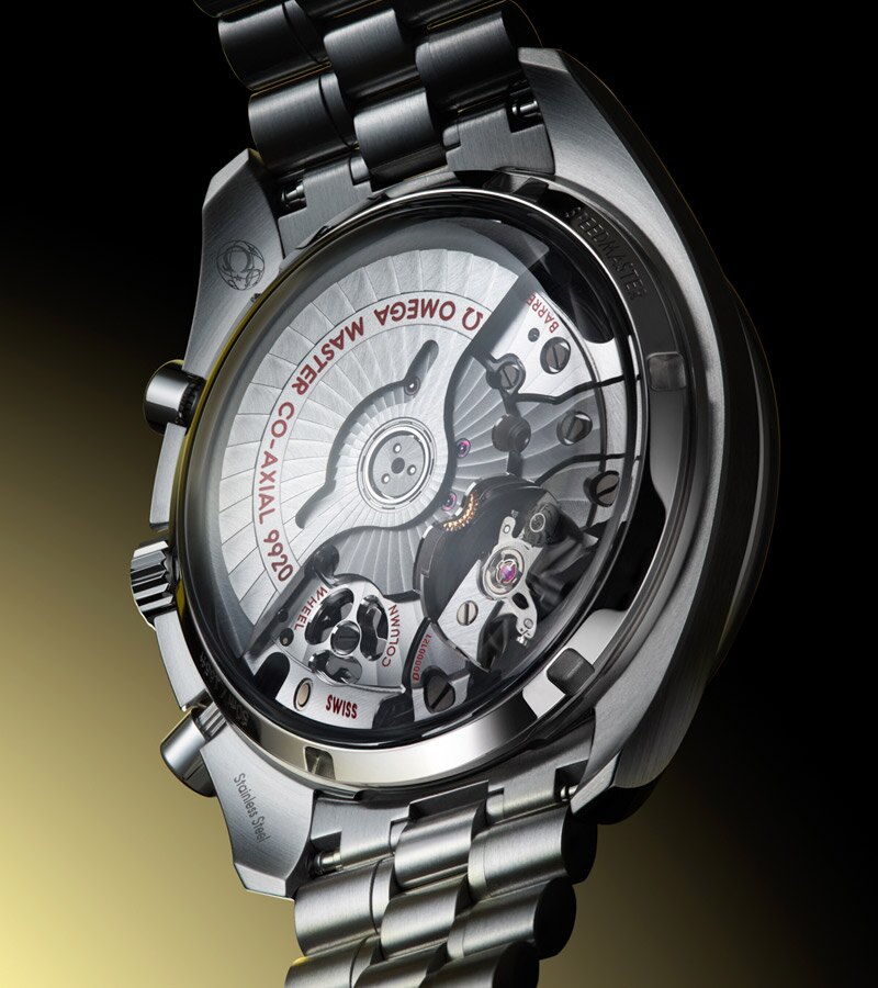 A watch movement being assembled by a watchmaker.
